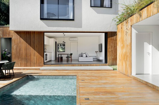 Casa Luna / Nommo Arquitetos + Coti Arquitetura - Fotografía interior, Cocina, Puerta, Concreto, Balcón