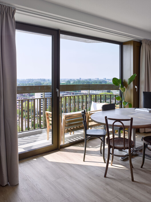 Opportuna Residential Tower  / Office Winhov + Office Haratori - Interior Photography, Dining room, Wood, Glass, Chair, Balcony