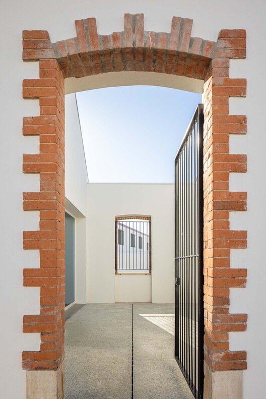 Rehabilitación Urbana del Barrio del Boneco / Adarq - André David, Arquitecto - Fotografía interior, Ladrillo
