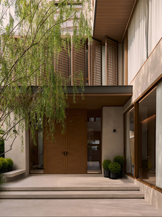Casa Khun Atiruj / PAON Architects Co.,Ltd. - Fotografia de Interiores, Porta, Concreto, Balcão, Aido