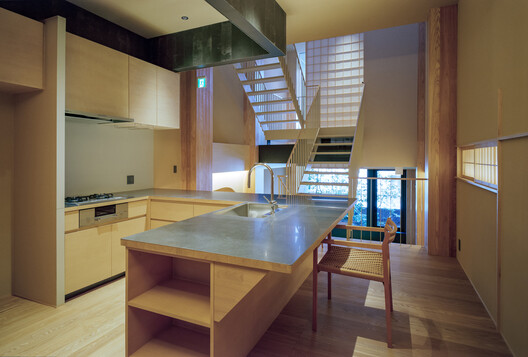 Private lodging in Minato-ku / FujiwaraMuro Architects - Interior Photography, Kitchen, Wood, Lighting, Countertop, Chair