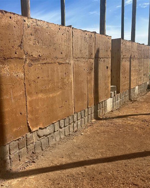 Henning Larsen Designs Rammed Earth Campus for Youth Academy in Uganda - Image 5 of 6
