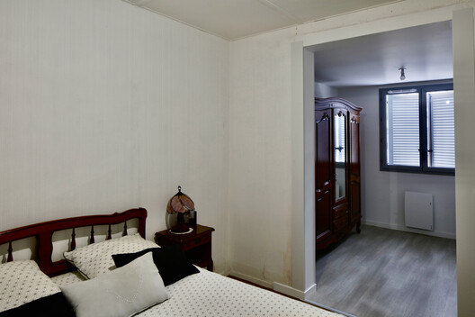 Beutre Housing Estates Rehabilitation / Christophe Hutin architecture - Interior Photography, Bedroom, Bed, Wood, Lighting