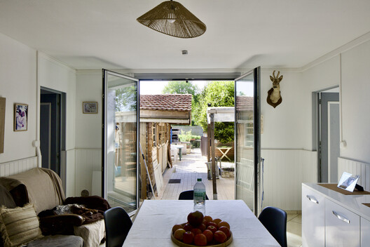 Beutre Housing Estates Rehabilitation / Christophe Hutin architecture - Interior Photography, Dining room, Wood, Chair, Door, Table
