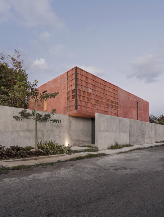 More Than Gray: 15 Projects That Explore Red Pigmented Concrete - Image 21 of 32
