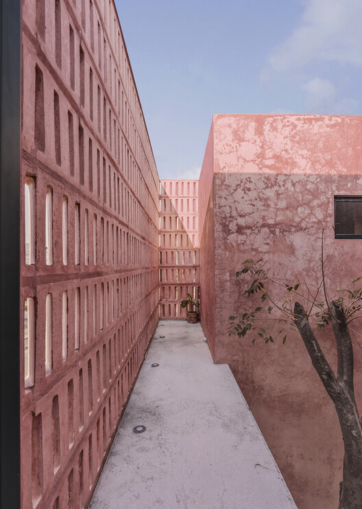 More Than Gray: 15 Projects That Explore Red Pigmented Concrete - Image 18 of 32