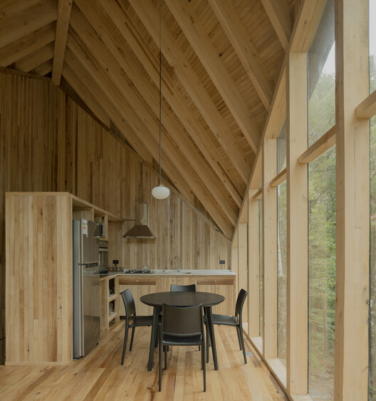 Refugio Calfuco / Tomás de Iruarrizaga - Interior Photography, Dining room, Wood, Beam