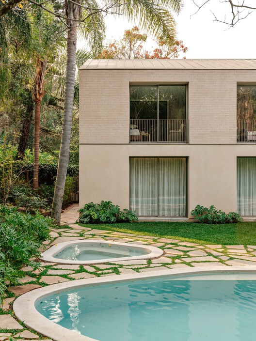 Casa PAB / SAAG Arquitetura - Fotografía exterior, Jardín, Concreto, Patio interior