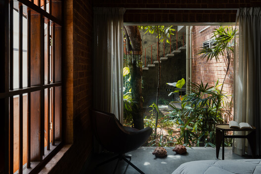 Of Trees and Gods and Mud House / Urava Architecture - Interior Photography, Brick, Chair