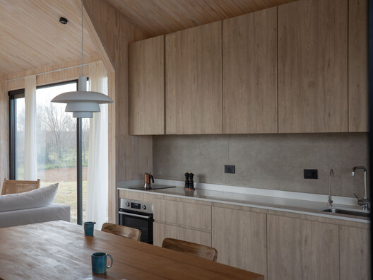 Casa en Villa Paranacito / Martina Lew Casa en Villa Paranacito / Martina Lew - Fotografía interior, Cocina, Madera, Encimera