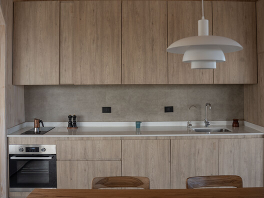 Casa en Villa Paranacito / Martina Lew Casa en Villa Paranacito / Martina Lew - Fotografía interior, Cocina, Encimera, Madera, Tarjas, Sillas