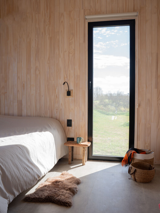 Casa en Villa Paranacito / Martina Lew Casa en Villa Paranacito / Martina Lew - Fotografía interior, Dormitorio, Madera