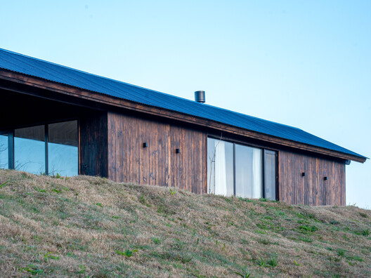 Casa en Villa Paranacito / Martina Lew Casa en Villa Paranacito / Martina Lew - Fotografía exterior, Madera