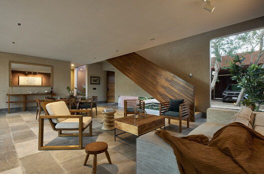 K'ab House / Lessmore Group - Interior Photography, Living Room, Wood, Sofa, Table, Chair, Lighting