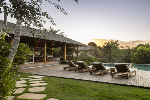 Ība House / Daniel Fromer - Exterior Photography, Garden, Chair, Patio, Courtyard