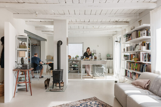 Reconstruction of a Reconstructed House / Kilo / Honc - Interior Photography, Living Room, Shelving, Lighting, Table, Chair
