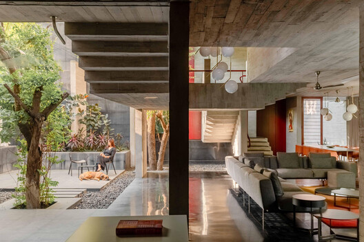 Trees Sliced Through Residence / Matharoo Associates - Interior Photography, Living Room, Wood, Chair