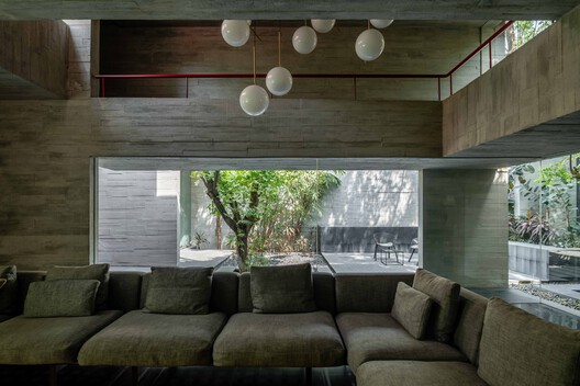 Trees Sliced Through Residence / Matharoo Associates - Interior Photography, Living Room, Wood, Concrete, Beam