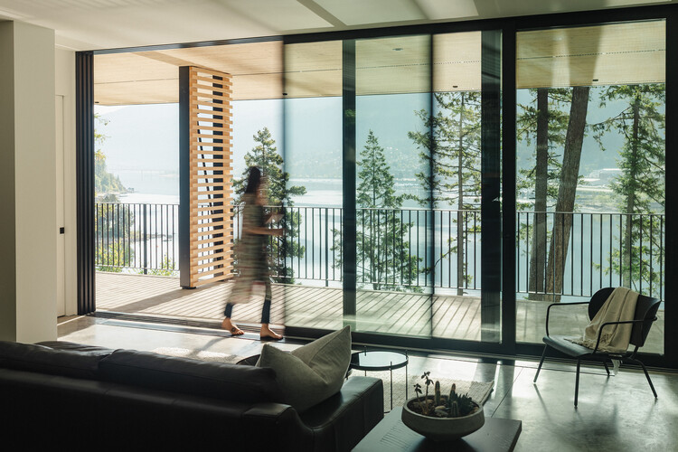 Oficina de Arquitectura Casa de la Costa / Stanley - Fotografía interior, sala de estar, sillas, balcón