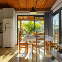 Casa Ecológica Campeche / Affonso Orciuoli + Marcelo Leal, arquitetos - Fotografia de Interiores, Casas, Terraço, Porta, Cadeira