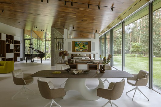 The Travelers’ House / BBGK Architects + Katarzyna Mach - Interior Photography, Dining room, Wood, Chair, Table, Lighting, Glass