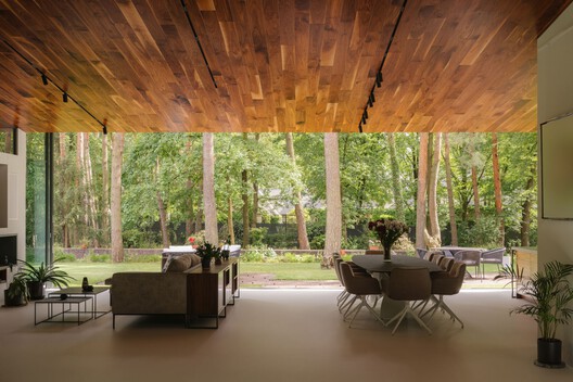 The Travelers’ House / BBGK Architects + Katarzyna Mach - Interior Photography, Living Room, Wood, Chair