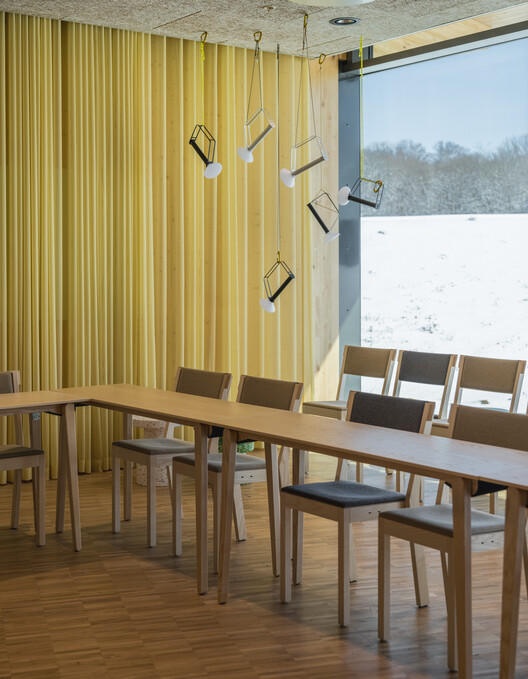 World of Volvo Experience Center / Henning Larsen - Interior Photography, Dining room, Wood, Chair