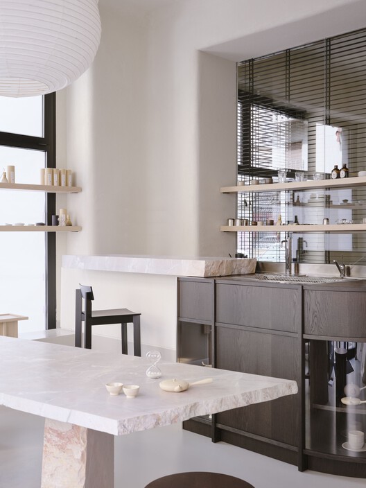 NOÏ Tea House and Pilates Studio / A I M - Interior Photography, Kitchen, Table, Lighting, Chair, Glass, Countertop
