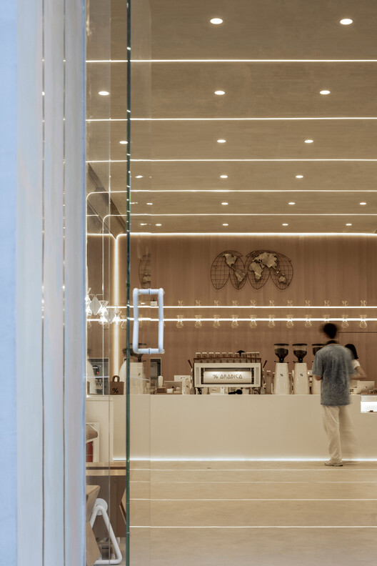 % Arabica Hangzhou MixC / Nguyen Khai Architects & Associates (NKAA) - Interior Photography, Wood, Lighting, Glass