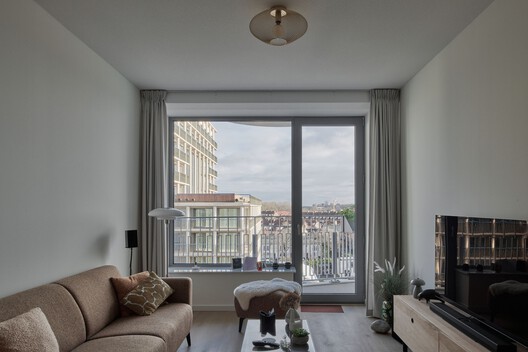 The August Social Housing / Team V Architecture - Interior Photography, Living Room, Balcony