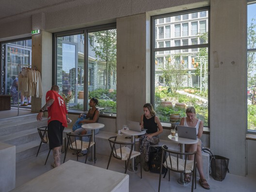 The August Social Housing / Team V Architecture - Interior Photography, Dining room, Concrete