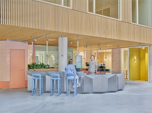 5TRACKS Mixed-Use District / Shift Architecture Urbanism + Powerhouse Company - Interior Photography, Kitchen, Glass, Chair