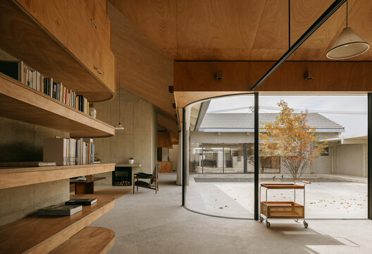 Raw Interiors: 35 Projects that Use Exposed Wood and Concrete