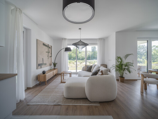 Lake 11 Home & Park / Coldefy + DDS Lake 11 Home & Park / Coldefy + DDS - Interior Photography, Living Room, Wood, Sofa, Lighting, Table, Chair