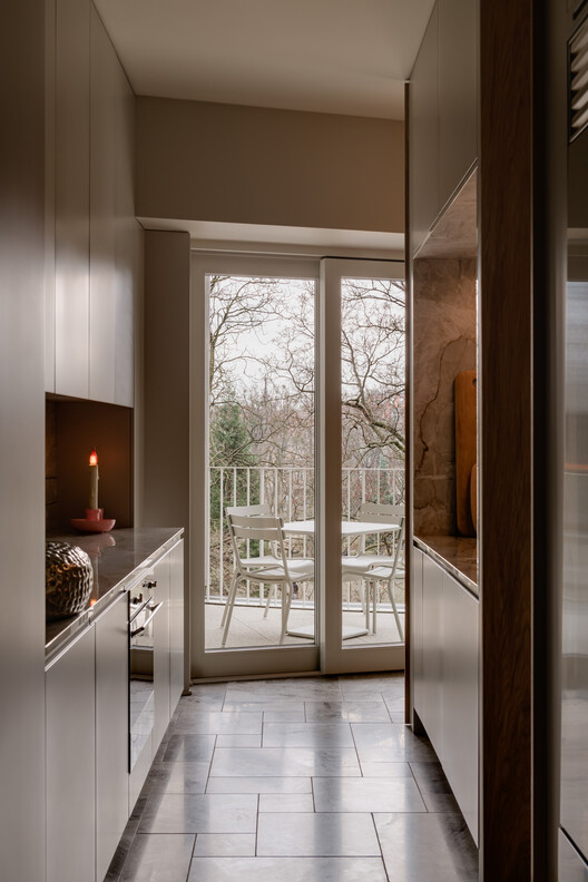 Luxury Apartament in Poznań / Studio GAB Luxury Apartament in Poznań / Studio GAB - Interior Photography, Wood, Kitchen, Countertop, Glass