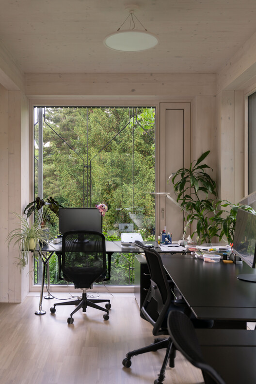 Terra Mater Factual Studios / Berger Parkkinen + Architects Terra Mater Factual Studios / Berger Parkkinen + Architects - Interior Photography, Chair, Wood, Table, Lighting, Glass