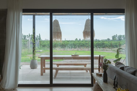 Casa Ringo / UNO MÁS UNO Arquitectos - Fotografía interior, Madera, Sillas