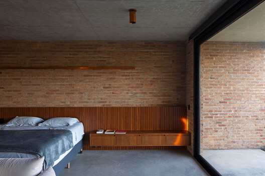 Casa Passiva / Mareines Arquitetura Casa Passiva / Mareines Arquitetura - Fotografía interior, Dormitorio, Madera, Ladrillo