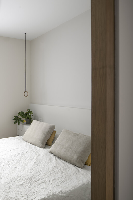 Rehabilitación del piso de Mallorca 423 / Barri Studio - Fotografía interior, dormitorio, madera, cama, iluminación