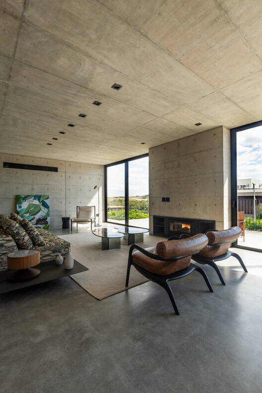 CASA RJ/Taller Concept Building - Interior de Fotográfica, sala de estar