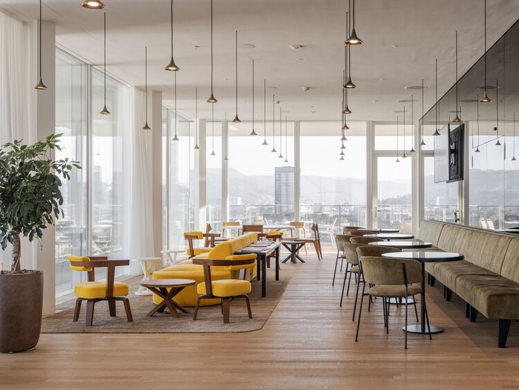 Helvetia Basilea / Herzog & De Meuron Campus - Fotografía interior, comedor, sillas