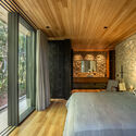 Casa 258 / Cornetta Arquitura - Fotografía interior, dormitorio, madera, cama