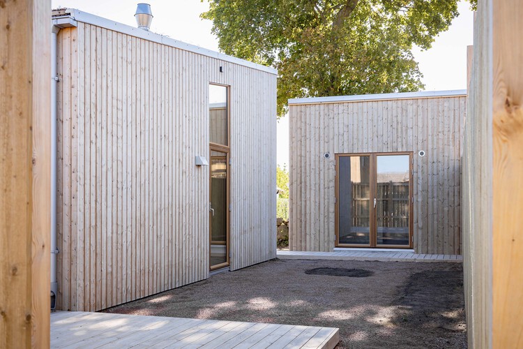 Casa Kivikhusen / STADSTUDIO - Fotografia de Exterior, Madeira, Porta, Concreto, Terraço