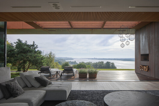 Casa na Encosta / 77 Studio architecture - Fotografia de Interiores, Sala de Estar, Cadeira