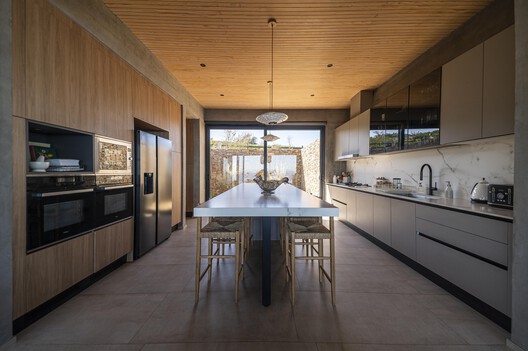 Casa D12 / PAR Arquitectos - Fotografía interior, Cocina, Madera, Encimera, Iluminación