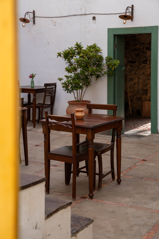Casa Sodade / estudio treze. - Fotografía interior, Comedor, Madera, Sillas, Patio interior