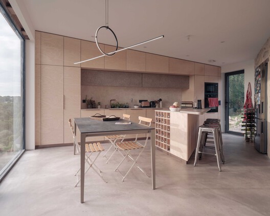 Chapel MI Residence / Atelier Ose Architecture - Interior Photography, Kitchen, Wood, Table, Lighting, Countertop, Chair