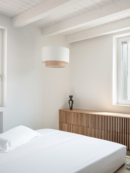 Palazzo Vittoria Building Renovation / CLAB Architettura Palazzo Vittoria Building Renovation / CLAB Architettura - Interior Photography, Bedroom, Wood, Bed, Lighting