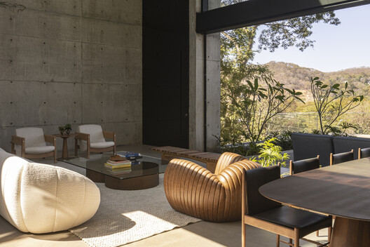 Casa Concreto / Dayala e Rafael arquitetos associados - Fotografia de Interiores, Sala de Estar, Madeira, Sofá, Cadeira