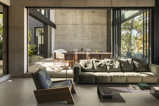 Casa Concreto / Dayala e Rafael arquitetos associados - Fotografia de Interiores, Sala de Estar, Madeira, Mesa, Cadeira
